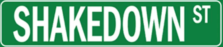 A green and white street sign with the word " edom ".