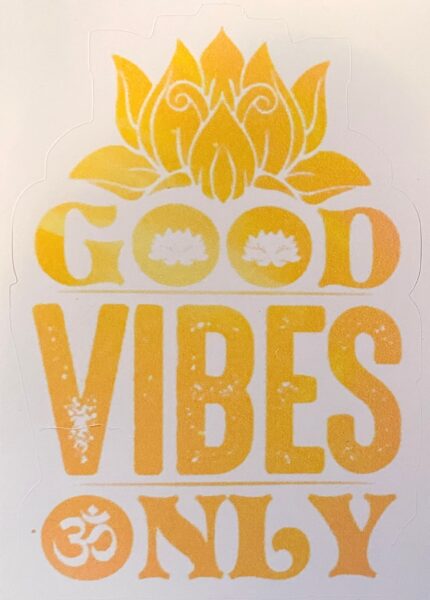 A sticker that says good vibes only with an image of a flower.