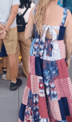 A woman wearing an american flag dress.