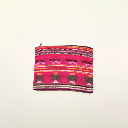 Pink patterned fabric zippered pouch.