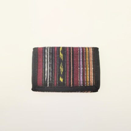 Striped fabric wallet with black trim.