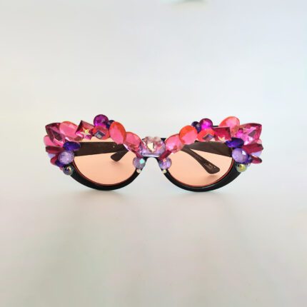 Pink and purple jeweled cat eye sunglasses.