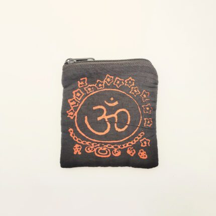 Black Om symbol zippered pouch.