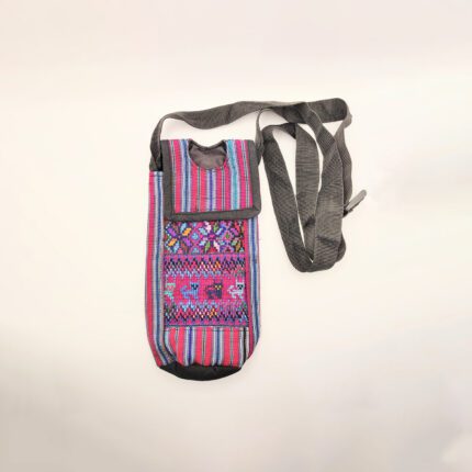 Pink and blue patterned crossbody bag.