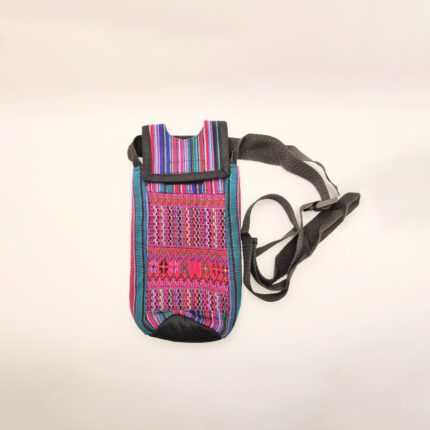 Colorful patterned fabric water bottle holder.