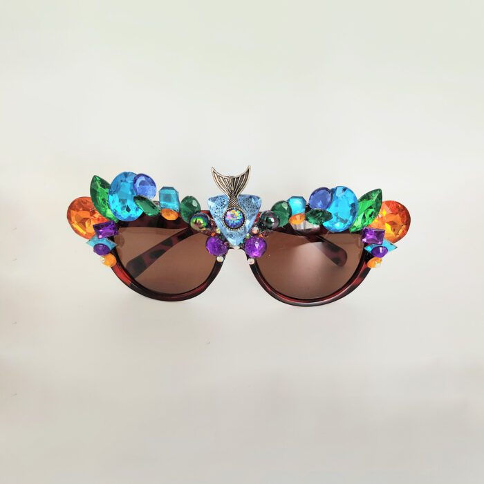 Colorful jeweled sunglasses with a mermaid tail.