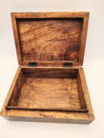 Open wooden box with hinged lid.