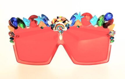 Red sunglasses with rainbow and jewels.