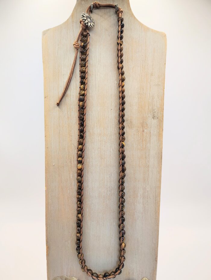 Brown leather cord necklace with tiger eye beads.