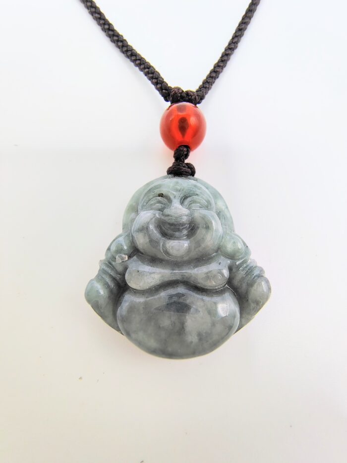 Jade Buddha pendant on black cord.