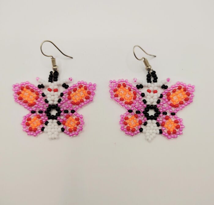 Beaded butterfly earrings in pink, white, and orange.