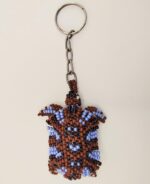 Beaded turtle keychain with blue accents.