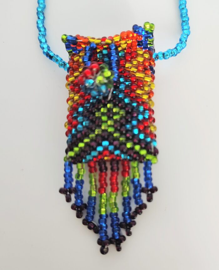 Rainbow beaded necklace with fringe.