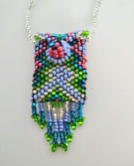 Beaded necklace with green and blue fringe.