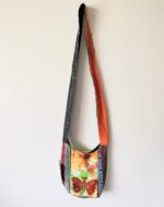 Colorful patchwork bag with butterfly design.