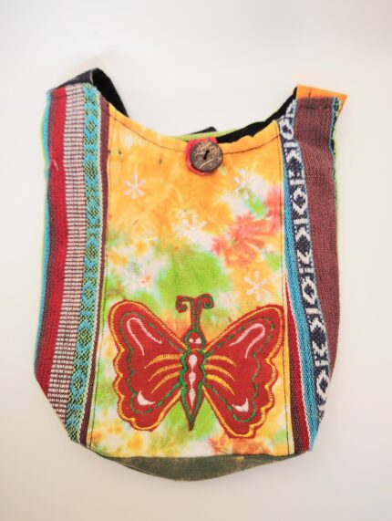 Multicolored fabric bag with a butterfly.