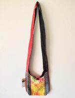 Colorful patterned shoulder bag with butterfly.