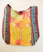 Colorful fabric bag with butterfly design.