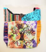 Colorful patchwork bag with tree design.