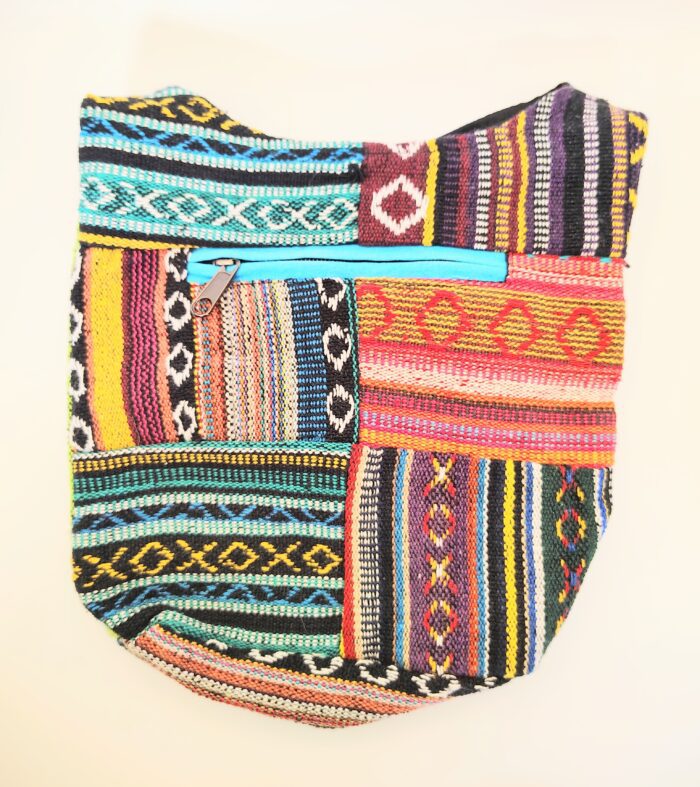 Colorful patterned fabric handbag with zipper.