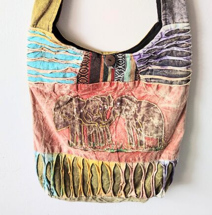 Patchwork bag with embroidered elephants.