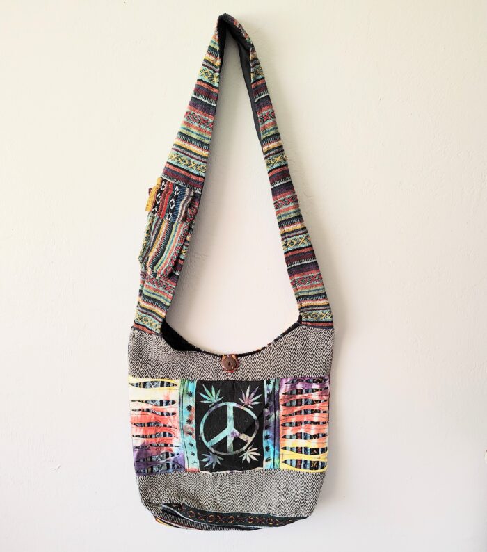 Multicolored peace sign shoulder bag.