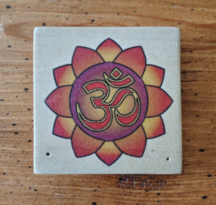 Om symbol on a colorful flower.