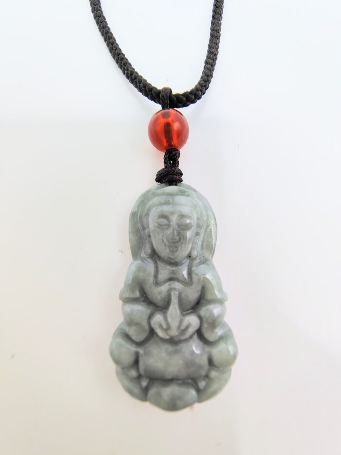 Jade Buddha pendant on black cord.