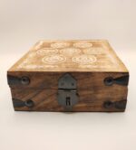 Wooden box with chakra symbols.