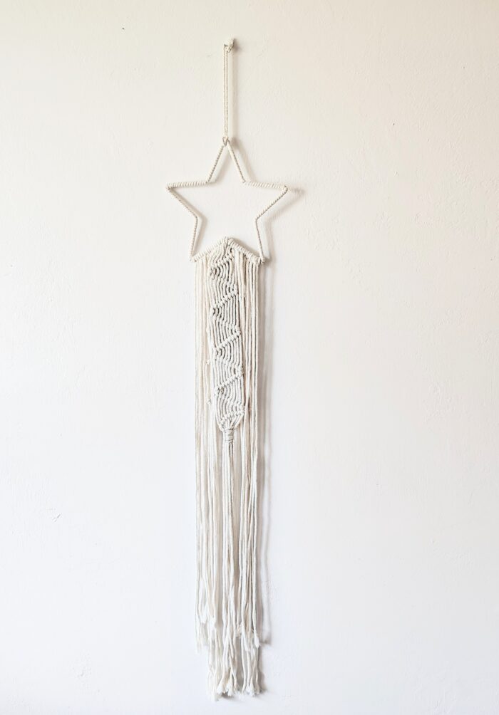 White macrame star wall hanging.