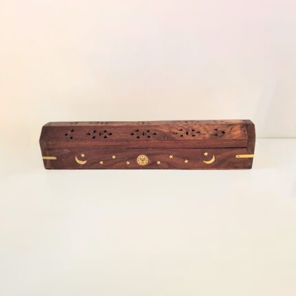 Wooden incense box with celestial design.