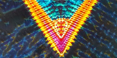 Abstract tie-dye pattern in vibrant colors.