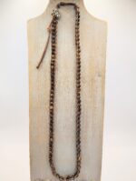 Brown leather necklace with tiger eye beads.