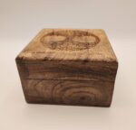 Wooden box with tree of life design.