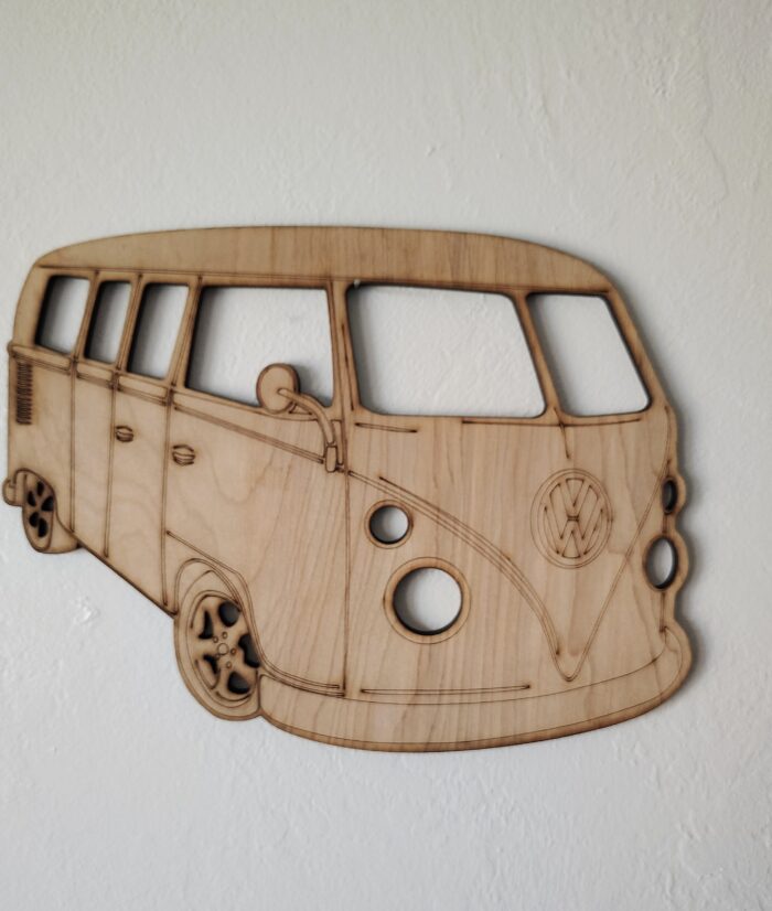 Wooden cutout of a Volkswagen van.