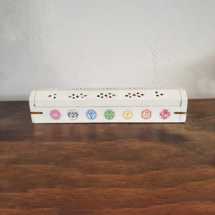 White wooden incense burner with chakras.